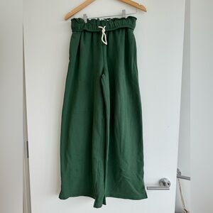 green out from under sweatpants